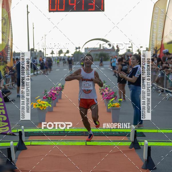 Buy your photos of the eventguia 13K Praia Grande on Fotop