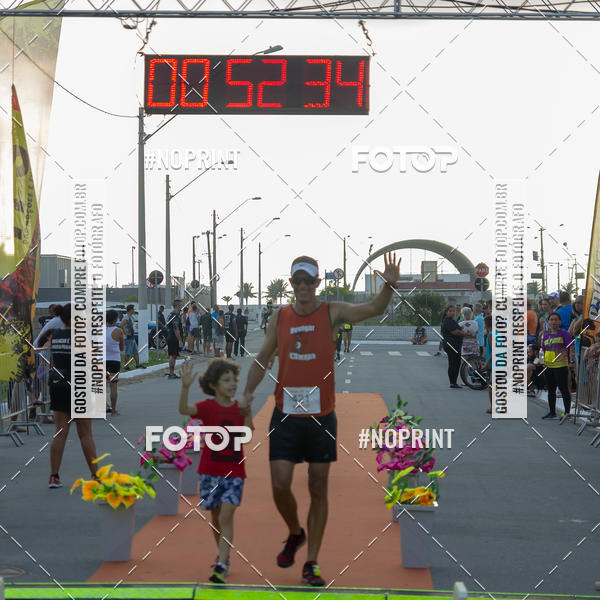 Buy your photos of the eventguia 13K Praia Grande on Fotop