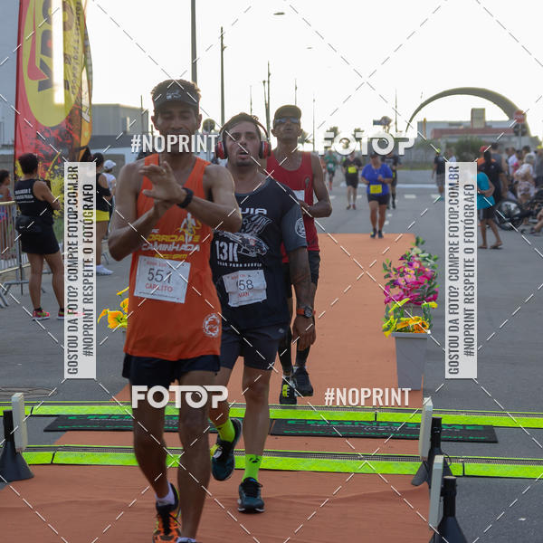 Buy your photos of the eventguia 13K Praia Grande on Fotop