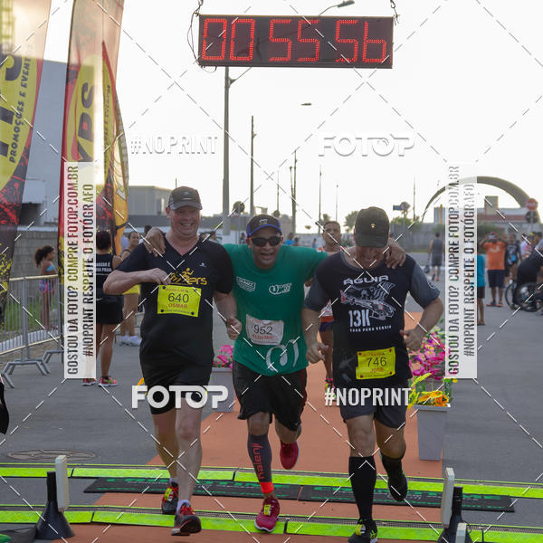 Buy your photos of the eventguia 13K Praia Grande on Fotop