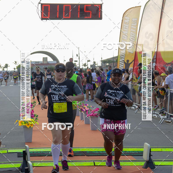 Buy your photos of the eventguia 13K Praia Grande on Fotop