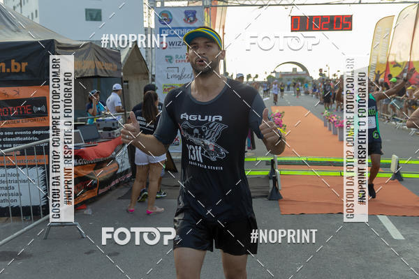 Buy your photos of the eventguia 13K Praia Grande on Fotop