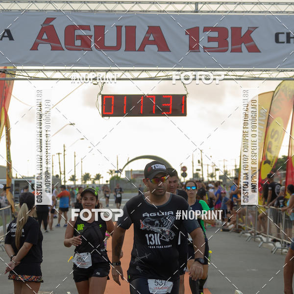 Buy your photos of the eventguia 13K Praia Grande on Fotop