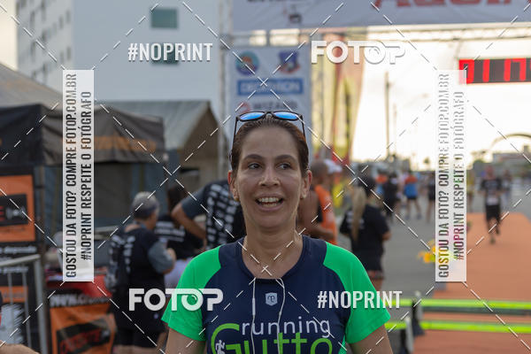 Buy your photos of the eventguia 13K Praia Grande on Fotop