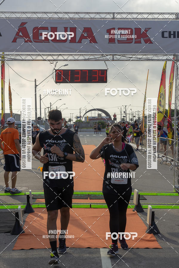 Buy your photos of the eventguia 13K Praia Grande on Fotop