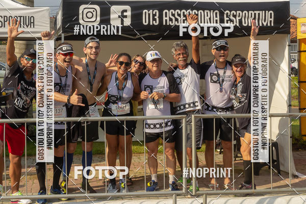 Buy your photos of the eventguia 13K Praia Grande on Fotop