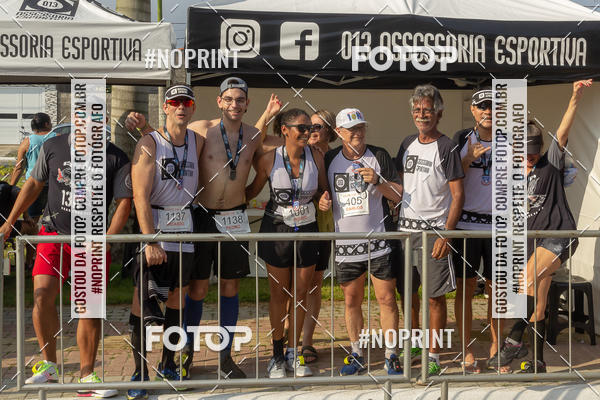 Buy your photos of the eventguia 13K Praia Grande on Fotop