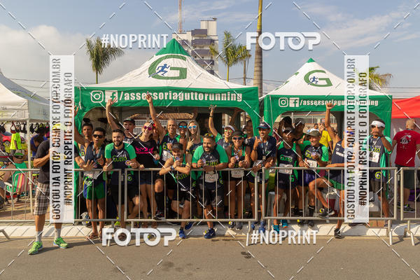 Buy your photos of the eventguia 13K Praia Grande on Fotop