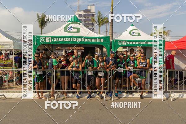 Buy your photos of the eventguia 13K Praia Grande on Fotop