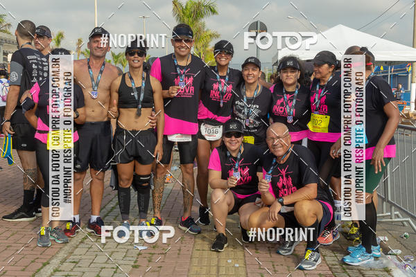 Buy your photos of the eventguia 13K Praia Grande on Fotop