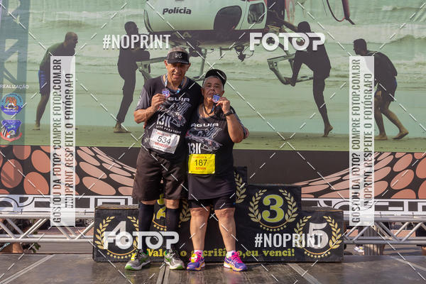 Buy your photos of the eventguia 13K Praia Grande on Fotop