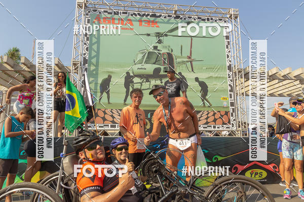 Buy your photos of the eventguia 13K Praia Grande on Fotop