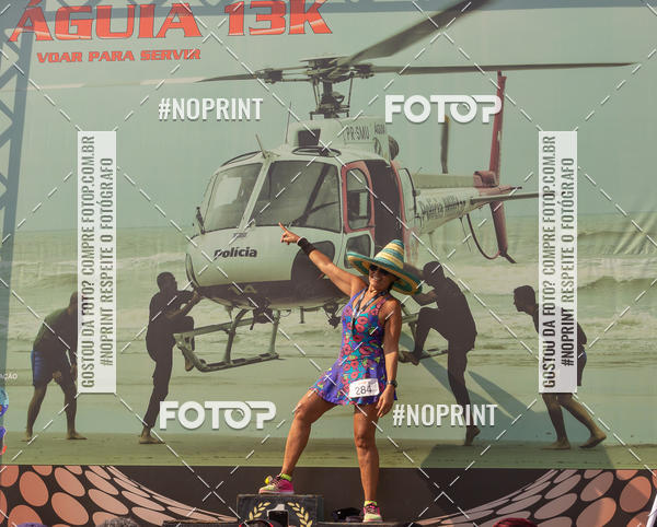 Buy your photos of the eventguia 13K Praia Grande on Fotop