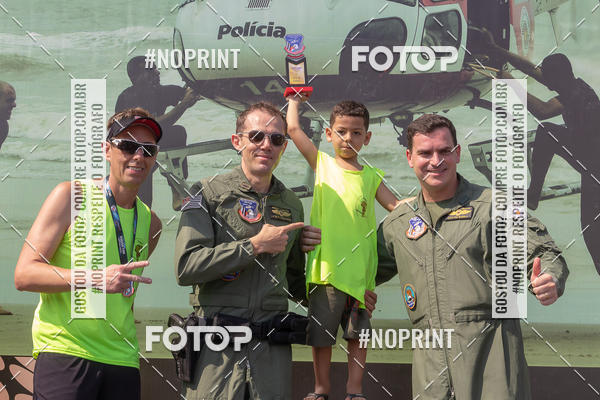 Buy your photos of the eventguia 13K Praia Grande on Fotop