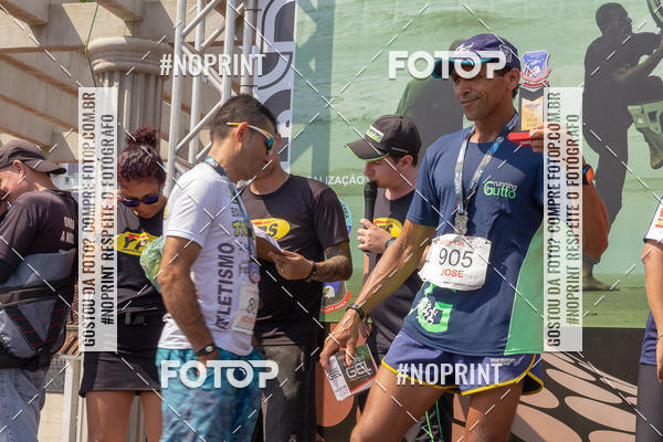 Buy your photos of the eventguia 13K Praia Grande on Fotop