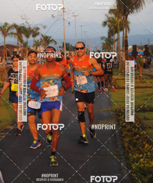 Buy your photos of the eventguia 13K Praia Grande on Fotop
