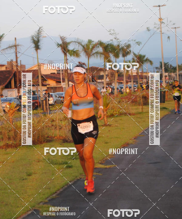Buy your photos of the eventguia 13K Praia Grande on Fotop