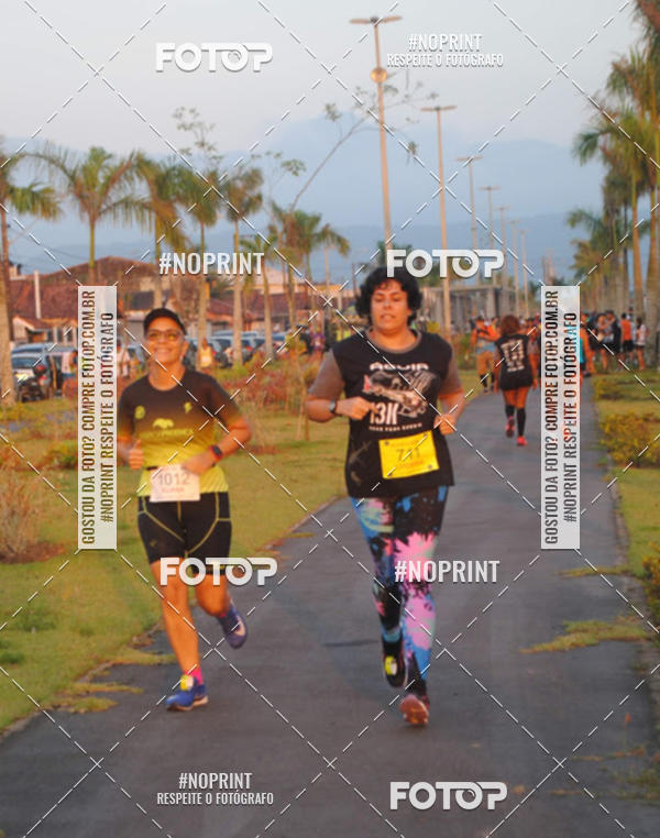 Buy your photos of the eventguia 13K Praia Grande on Fotop