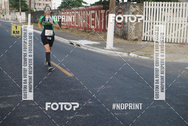 Buy your photos of the eventguia 13K Praia Grande on Fotop