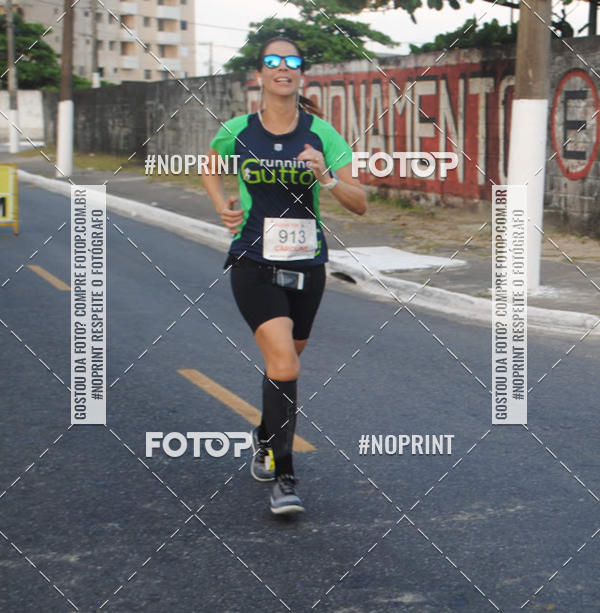 Buy your photos of the eventguia 13K Praia Grande on Fotop