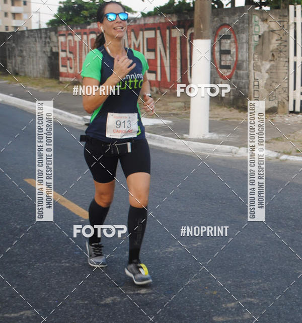 Buy your photos of the eventguia 13K Praia Grande on Fotop