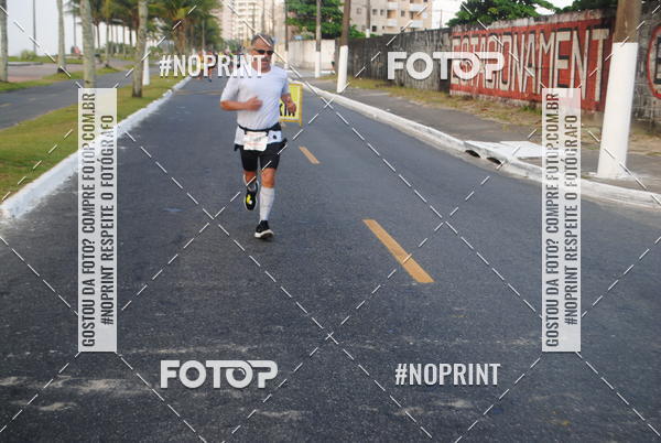 Buy your photos of the eventguia 13K Praia Grande on Fotop