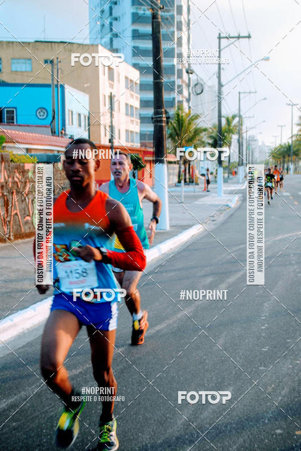 Buy your photos of the eventguia 13K Praia Grande on Fotop