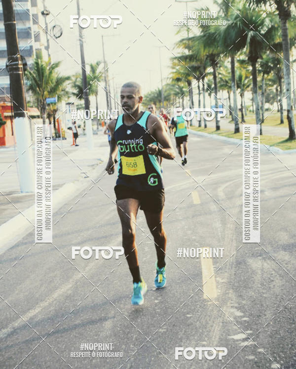 Buy your photos of the eventguia 13K Praia Grande on Fotop