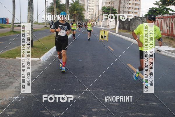 Buy your photos of the eventguia 13K Praia Grande on Fotop