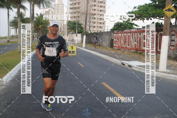 Buy your photos of the eventguia 13K Praia Grande on Fotop