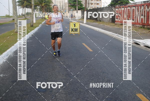 Buy your photos of the eventguia 13K Praia Grande on Fotop
