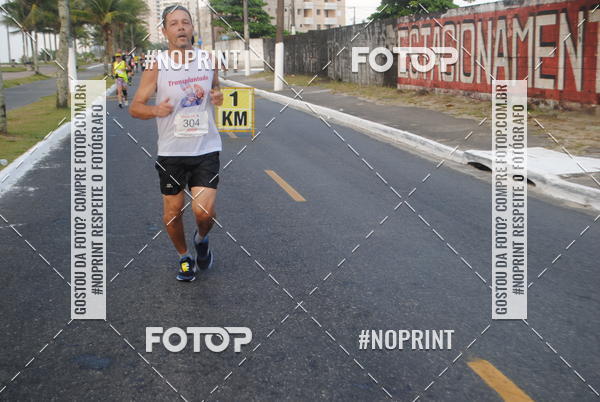 Buy your photos of the eventguia 13K Praia Grande on Fotop