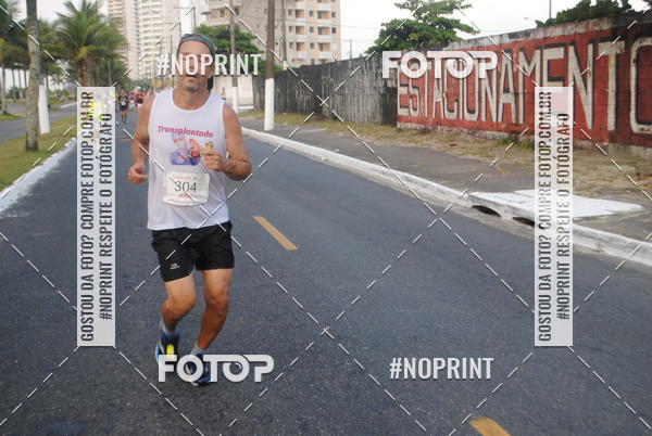 Buy your photos of the eventguia 13K Praia Grande on Fotop