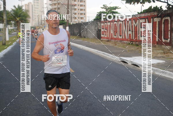 Buy your photos of the eventguia 13K Praia Grande on Fotop