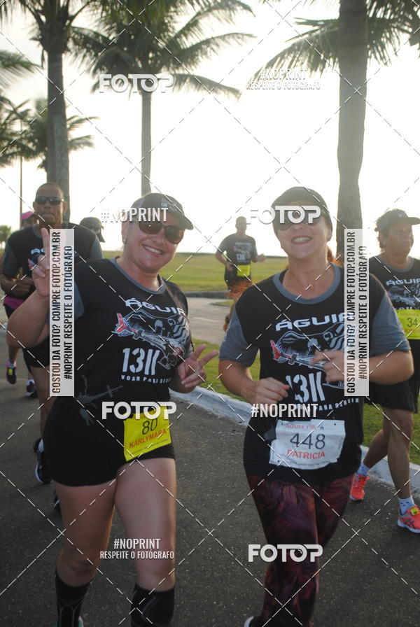 Buy your photos of the eventguia 13K Praia Grande on Fotop