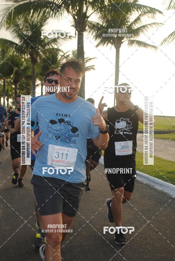 Buy your photos of the eventguia 13K Praia Grande on Fotop