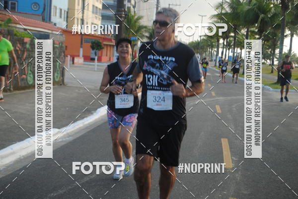 Buy your photos of the eventguia 13K Praia Grande on Fotop