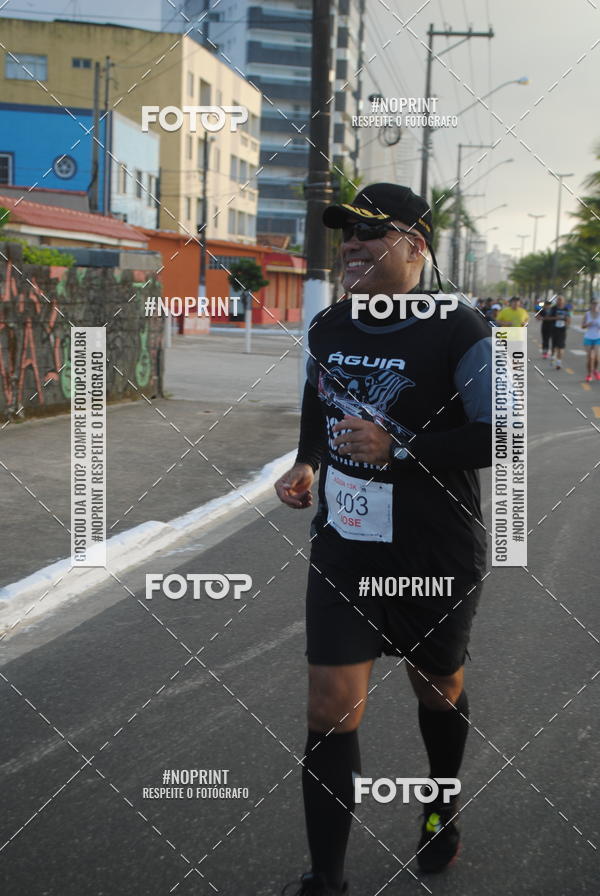 Buy your photos of the eventguia 13K Praia Grande on Fotop