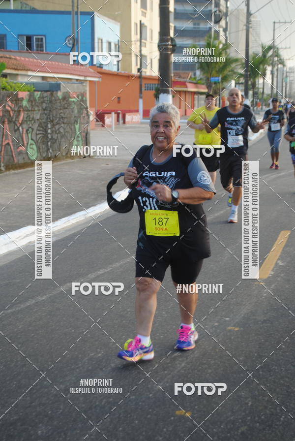 Buy your photos of the eventguia 13K Praia Grande on Fotop