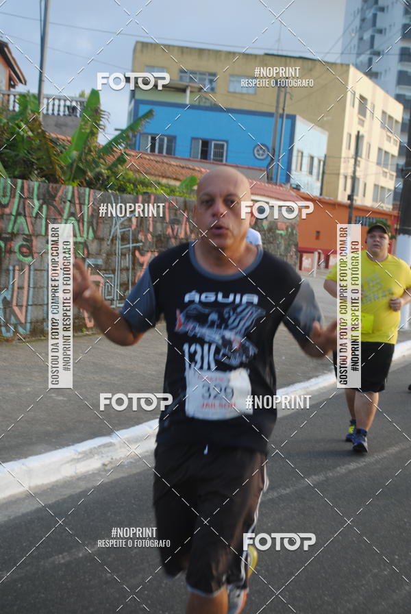 Buy your photos of the eventguia 13K Praia Grande on Fotop
