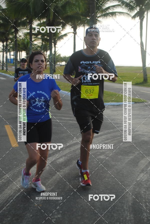Buy your photos of the eventguia 13K Praia Grande on Fotop