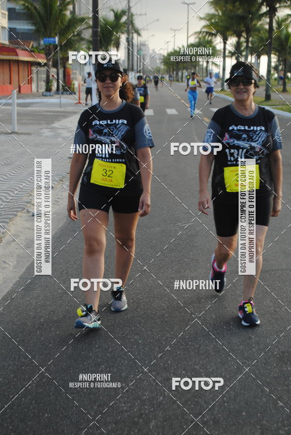 Buy your photos of the eventguia 13K Praia Grande on Fotop