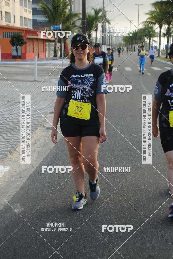 Buy your photos of the eventguia 13K Praia Grande on Fotop