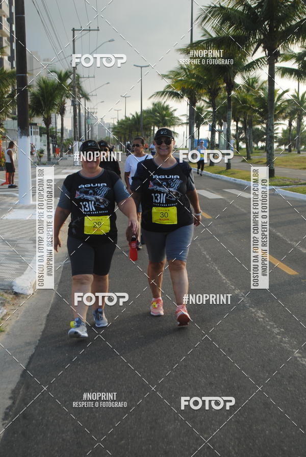 Buy your photos of the eventguia 13K Praia Grande on Fotop