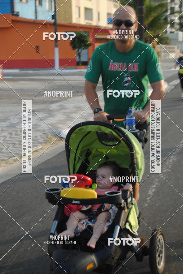 Buy your photos of the eventguia 13K Praia Grande on Fotop