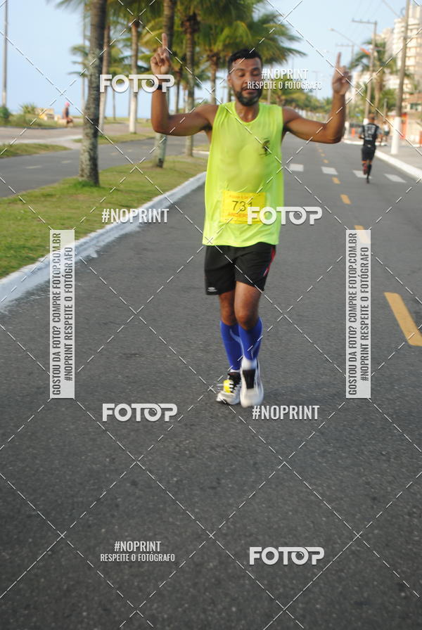 Buy your photos of the eventguia 13K Praia Grande on Fotop