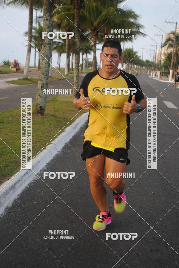 Buy your photos of the eventguia 13K Praia Grande on Fotop