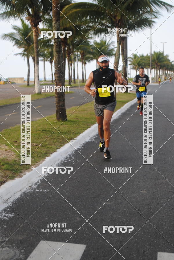 Buy your photos of the eventguia 13K Praia Grande on Fotop
