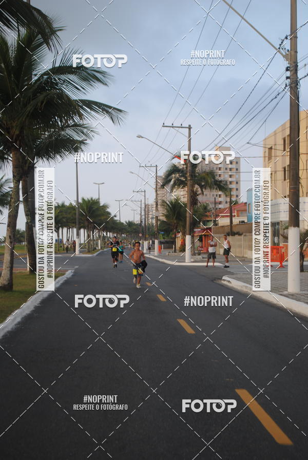 Buy your photos of the eventguia 13K Praia Grande on Fotop