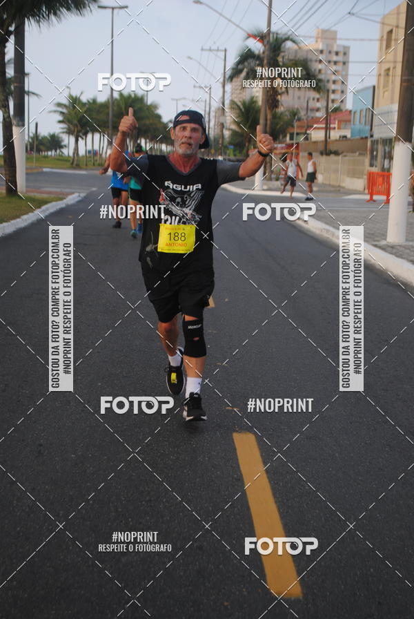 Buy your photos of the eventguia 13K Praia Grande on Fotop